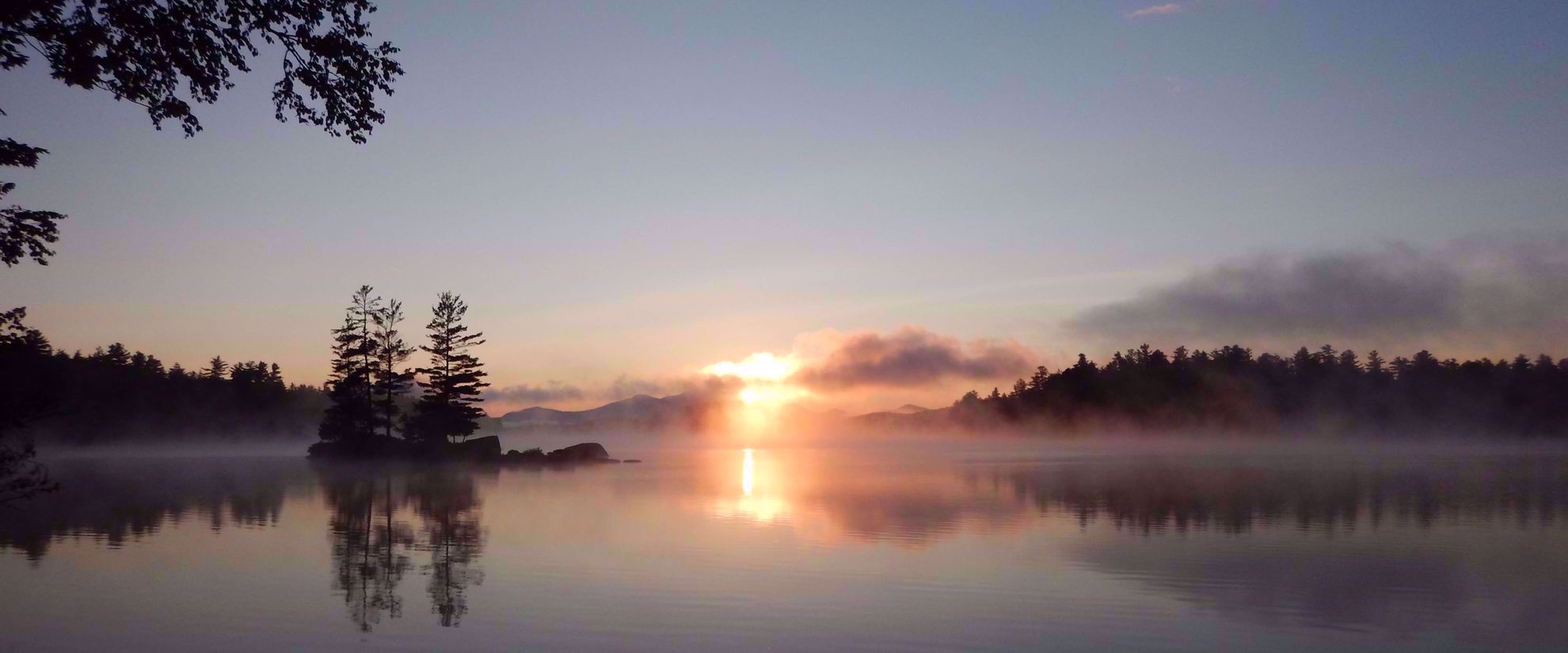 Picture of Kayaking the Adirondacks sunset through clouds adirondacks