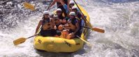 Women rafting together on a group tour