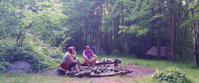Female travel group chatting by campsite on Appalachian Trail