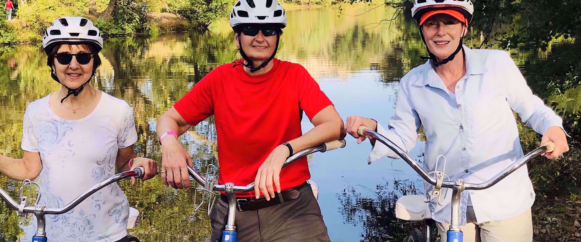 Women biking together on group travel through Georgia