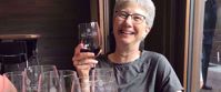 Picture of Blue Ridge Rambling Woman enjoying wine on travel tour through blue ridge