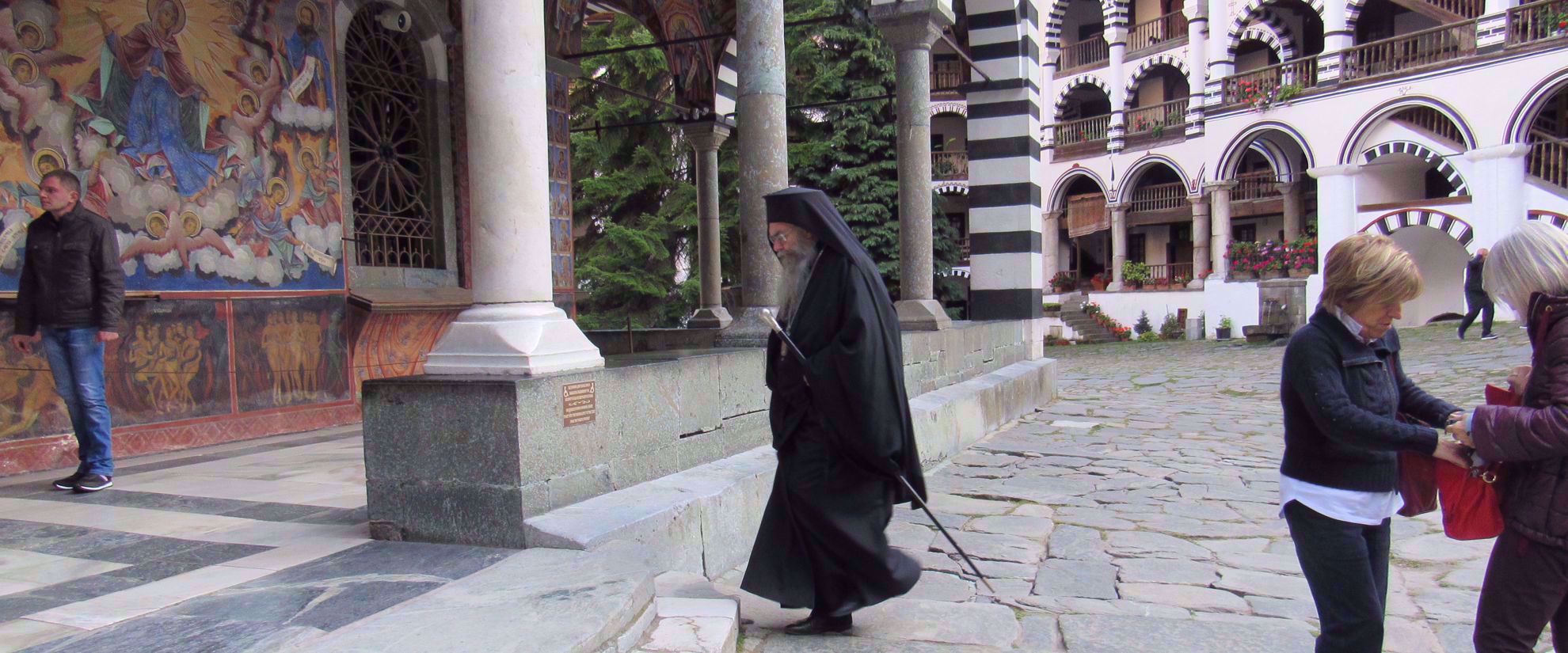 Priest walking in Monastery in bulgaria