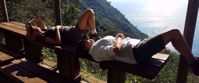 Women relaxing in the sun on hike through italian riviera