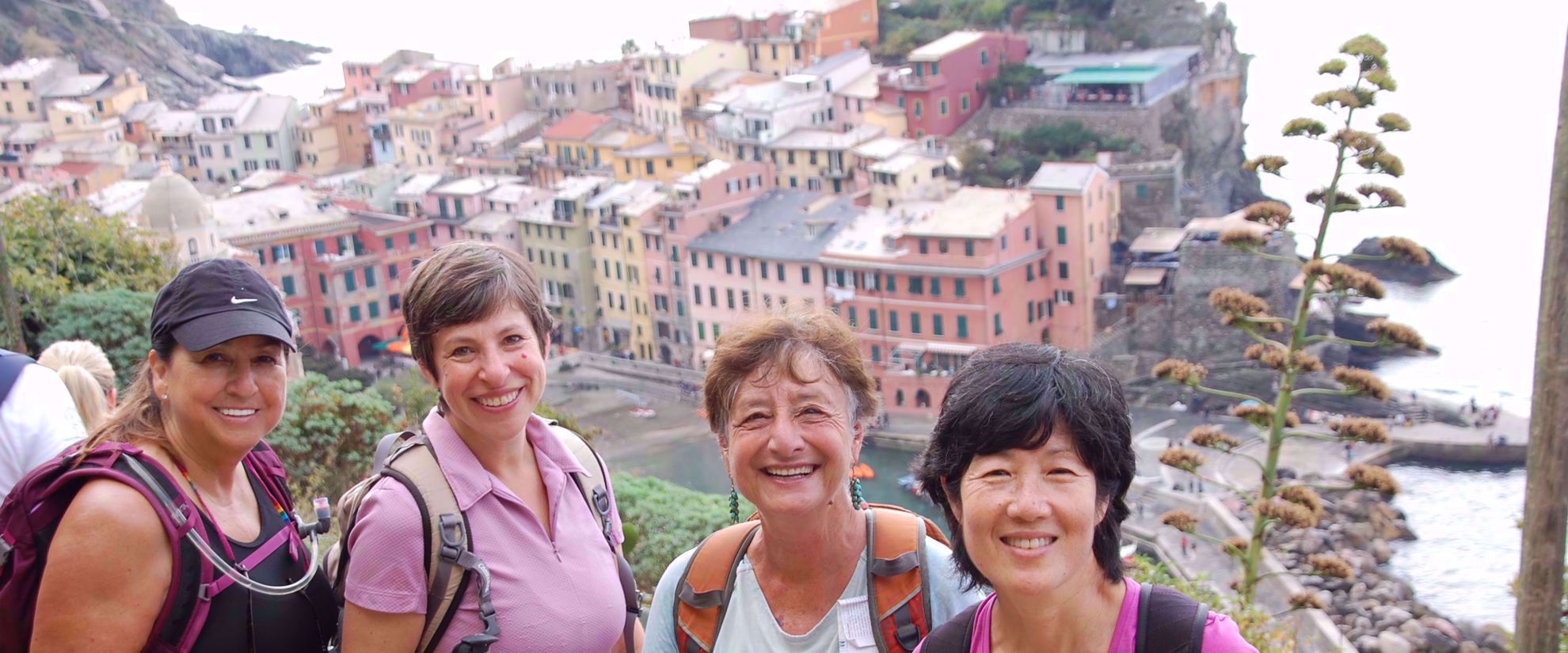 women smiling on group trip to cinque terre and the italian riviera