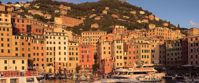 Sun shining on buildings sunset on italian riviera