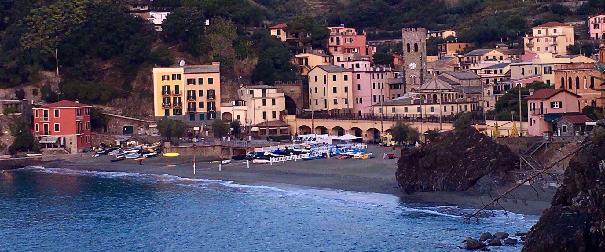 Beach in italy with colorful buildings