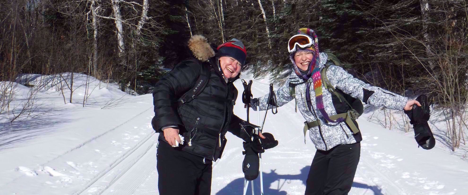 women's travel group dog sledding through tofte minnesota