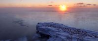 beautiful sunset over frozen lake in tofte minnesota