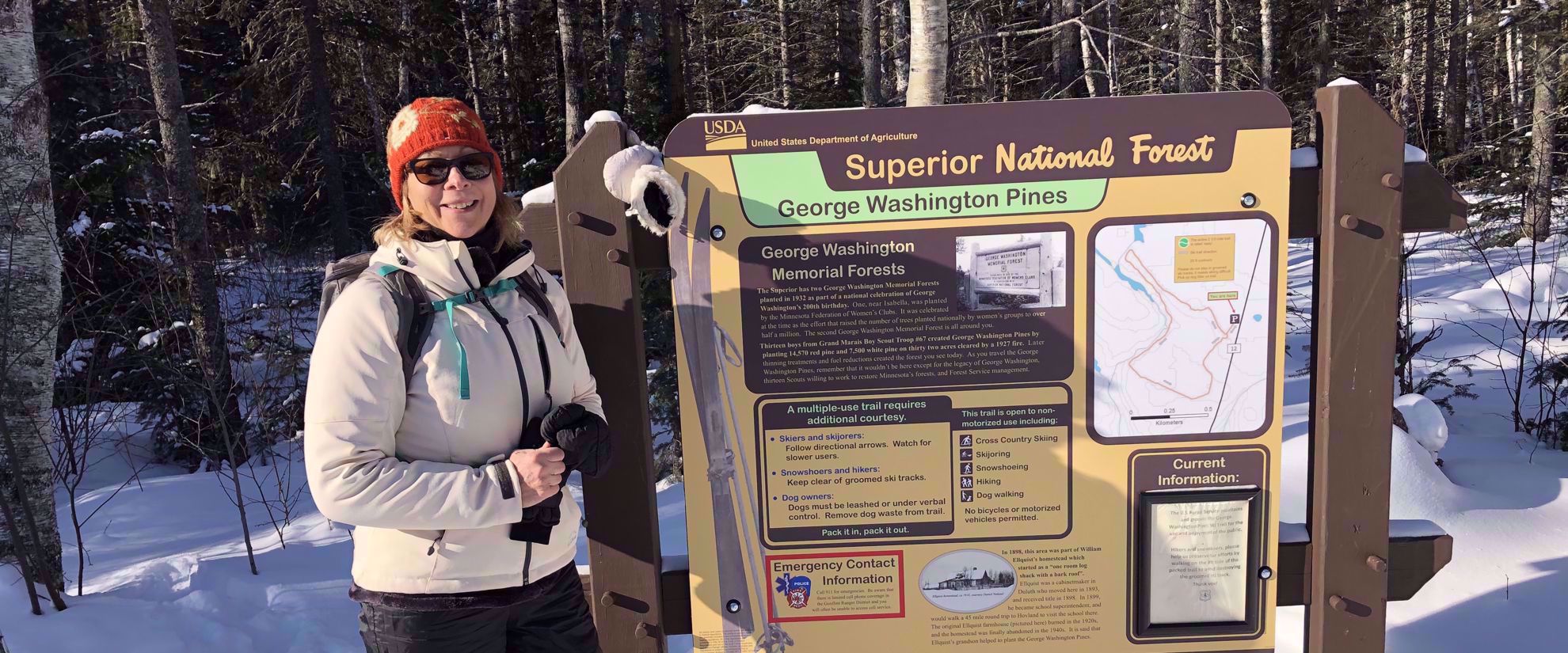 woman standing by superior national forest george washington pines sign