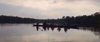 Picture of Ecuador's Amazon Jungle canoeing through amazon at sunset