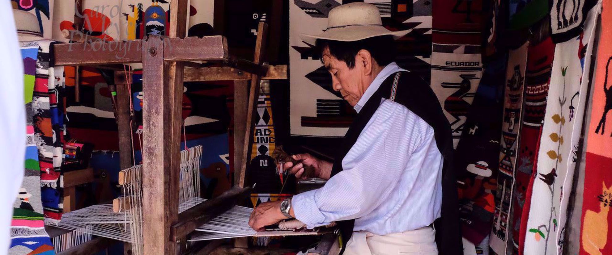 Picture of Exploring the Galapagos Islands by Land local man crafting goods on galapagos islands