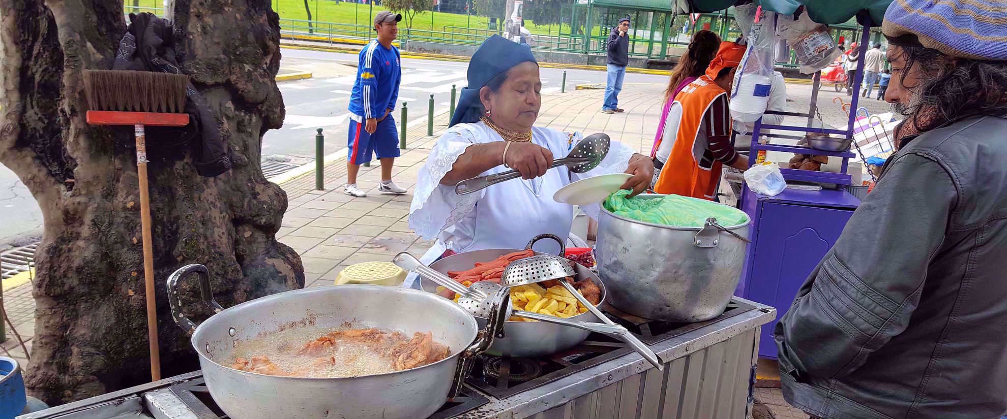 woman preparing local cuisine on galapagos islands