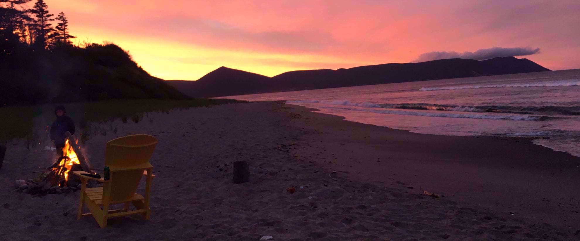 Picture of Highlights of Nova Scotia stunning sunset on beach with fire in nova scotia