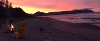Picture of Highlights of Nova Scotia stunning sunset on beach with fire in nova scotia