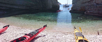 kayaks on beach crystal clear water croatia