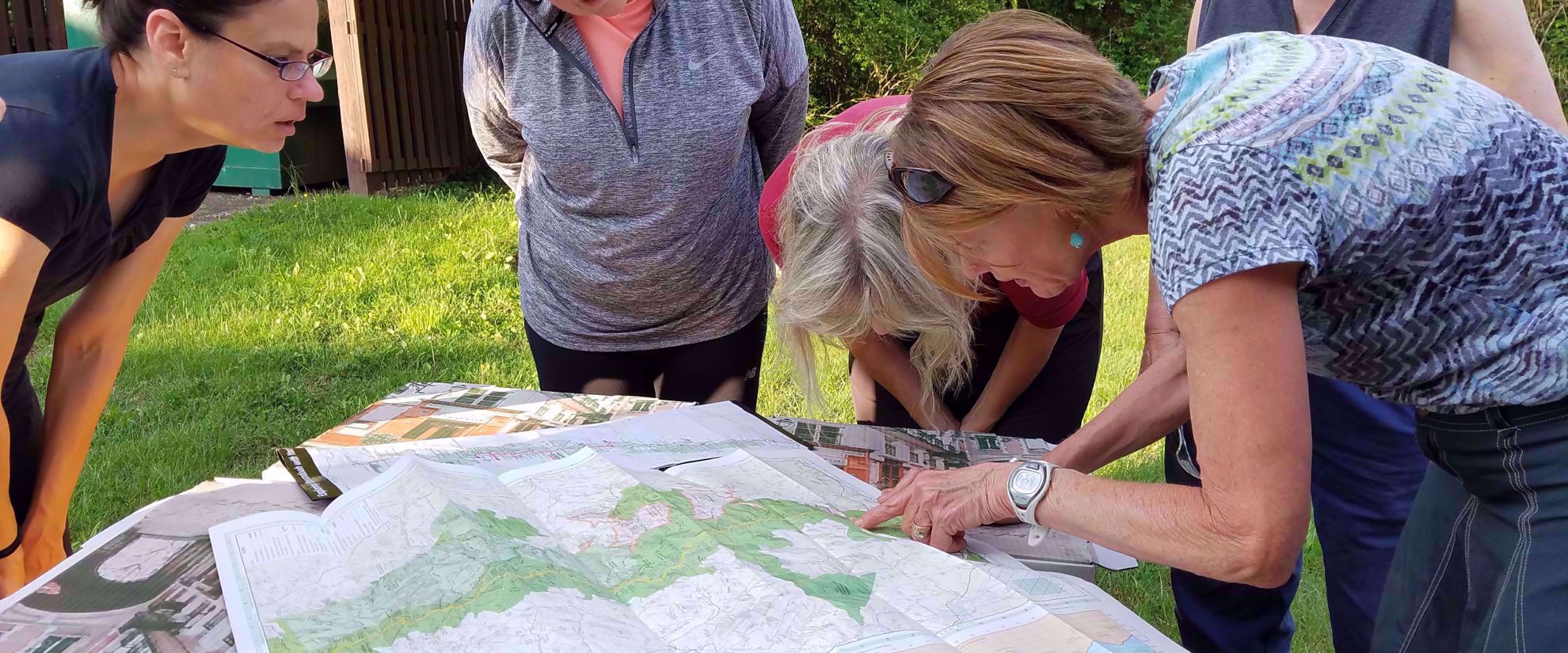 Picture of Hiking Lodge to Lodge on the Appalachian Trail women studying map appalachian trail