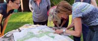women studying map appalachian trail