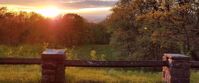 Picture of Hiking Lodge to Lodge on the Appalachian Trail sunset over field with brick and wood fence