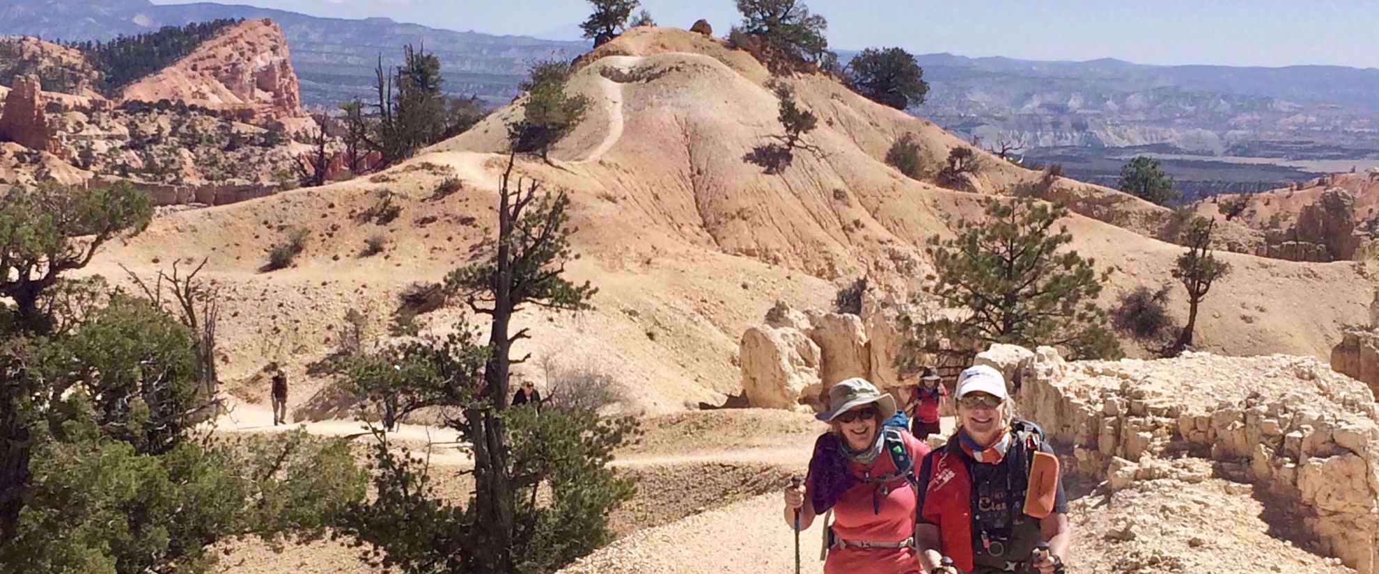 Picture of Hiking the Grand Staircase National Parks woman pose for photo on hike in utah