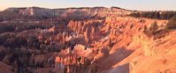 Picture of Hiking the Grand Staircase National Parks sun shining on rock formations in bryce national park