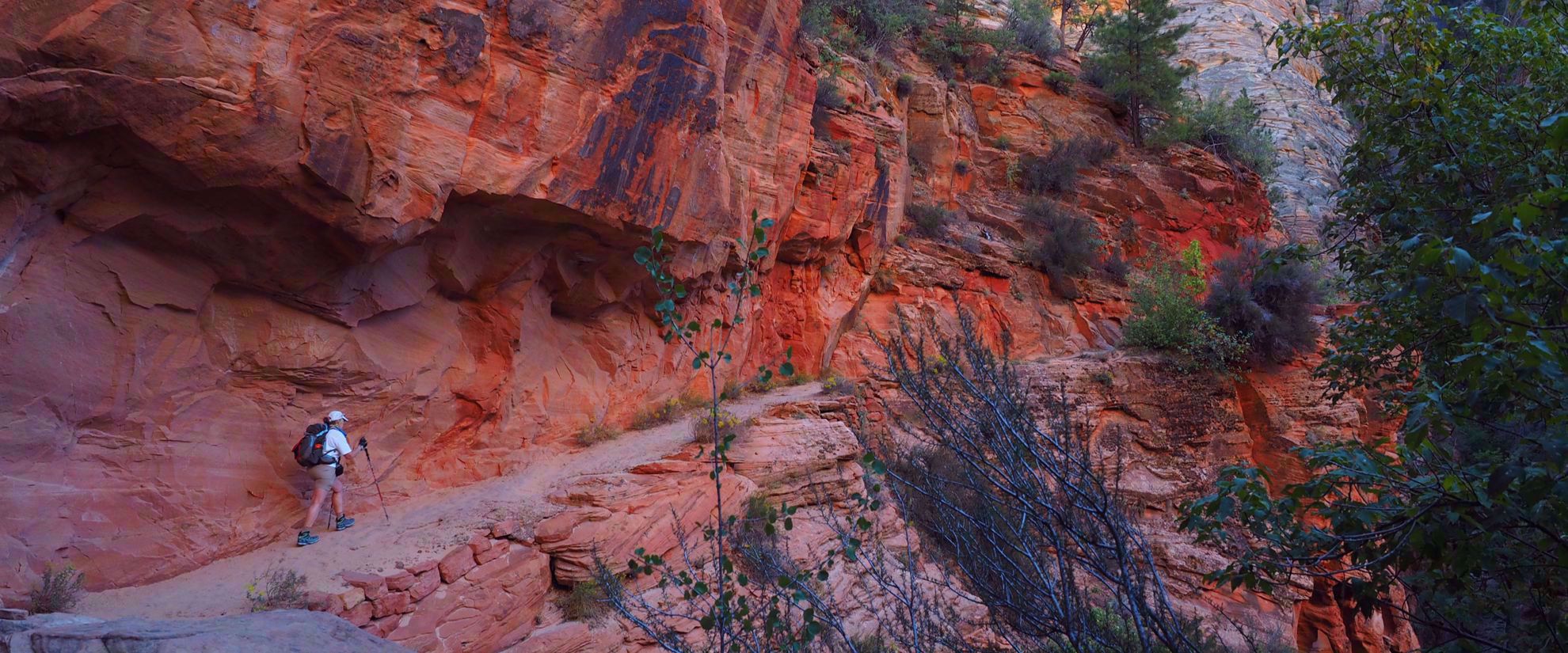 woman hikes red rock in bryce national park kanab utah