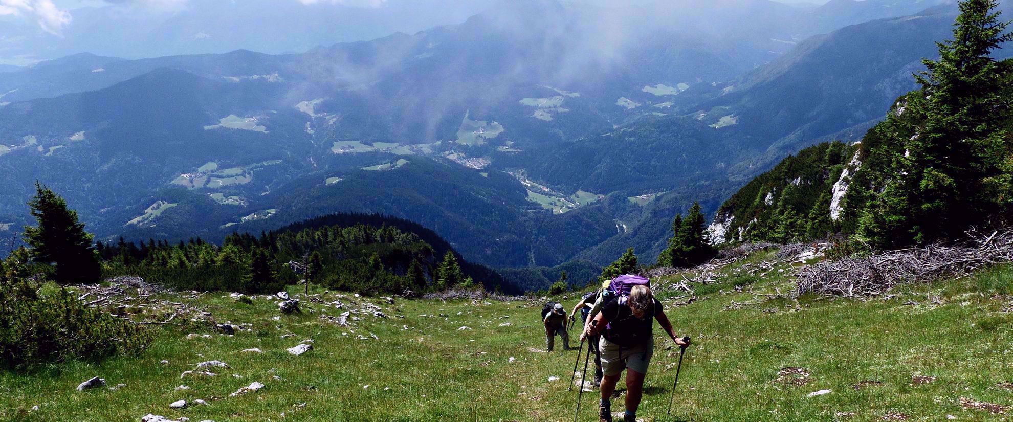 women hike steep mountains julian alps