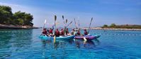 Picture of Pearls of the Croatian Coast women kayaking in bright blue water croatia