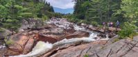 Picture of Slackpacking Maine water rushing through shallow river in maine