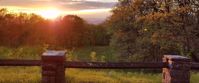 Picture of Slackpacking Virginia sunset through trees with brick pillars in virginia
