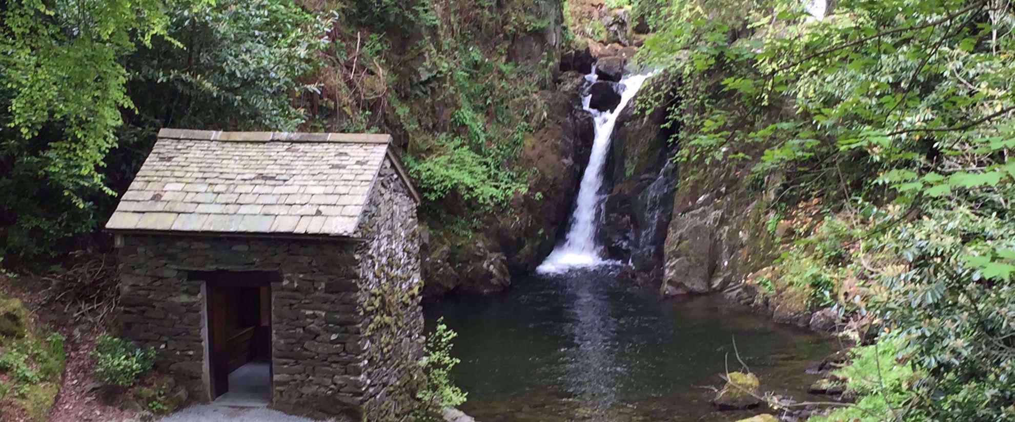 Picture of Tramping the Lake District waterfall and abandoned rock building in forest Grasmere uk