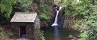 Picture of Tramping the Lake District waterfall and abandoned rock building in forest Grasmere uk