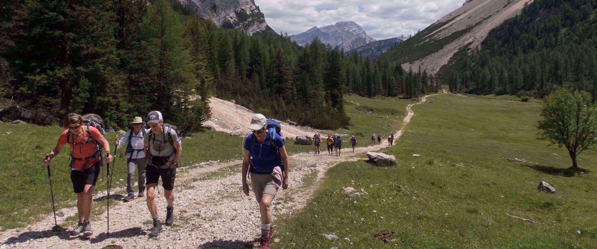 Picture of Hiking Italy's Northern Alps women hike on path through northern italian alps on group adventure tour
