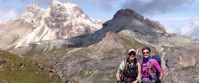 women smile on group trek through northern italian alps