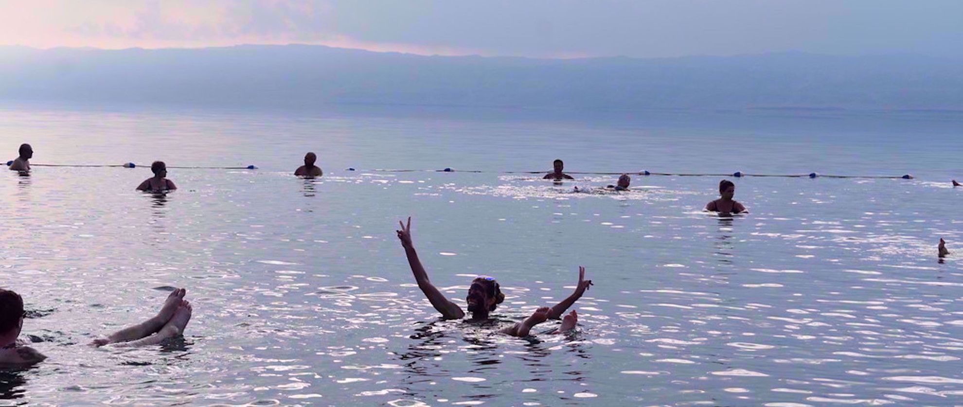 Swimming in the Dead Sea women's travel group swimming in dead sea