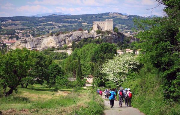walking into Vaison de Romaine on a women's hiking trip in Provence